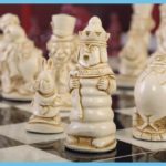 Red And Natural Alice In Wonderland Chess Sets