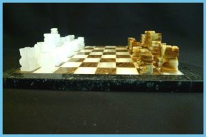 aztec mayan chess set with marble pieces black and brown chessboard and pieces